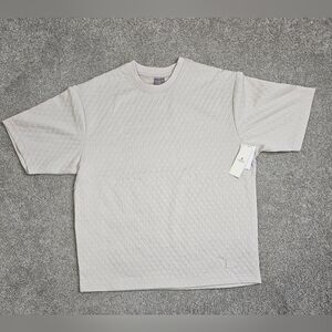 This is a Saints Studio men's apparel embossed textured t-shirt in a beige